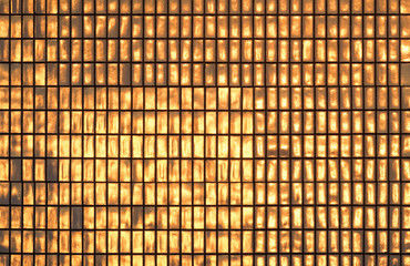 Wall tiles reflect sunlight. Abstract background or texture.