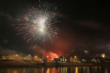 Celebration of New Year's Eve with fireworks in Bronnoysund Northern Norway
