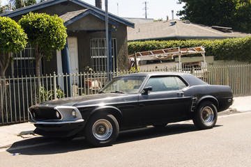 Side view of a classic vintage American muscle car in the street