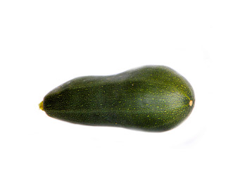 Green zucchini closeup on white isolated background. Vegetable, Studio image. Copy space. Horizontal image. Vegetarian food.
