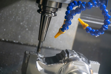 The CNC milling machine cutting the injection mold part by solid flat end mill tool.Mold...