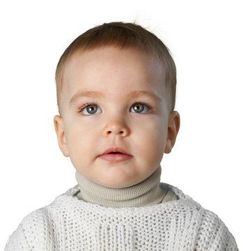 Young boy with a neutral expression