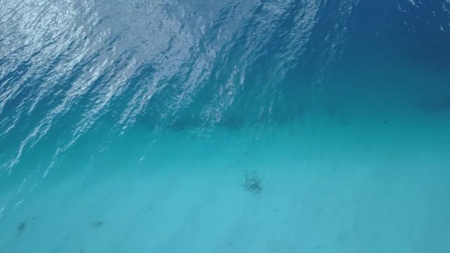 Aerial footage from a drone of blue lagoon and Otemanu mountain at Bora Bora island, Tahiti, French Polynesia, South Pacific Ocean (Bora Bora Aerial)

