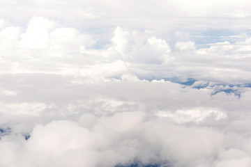 clouds and blue sky seen from plane
