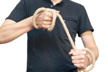 A man holds a rope in his hands and tries to tighten it. One hand with a rope pulls out another hand. A man tries to save himself