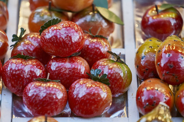 close up of marzipan fruits on market stall
