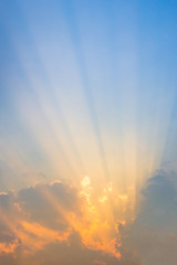 Beautiful sun beams along the sky after the sunset.
