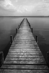 Deurstickers Wooden pier at silence lake, monochrome shoot © Margarita Borodina