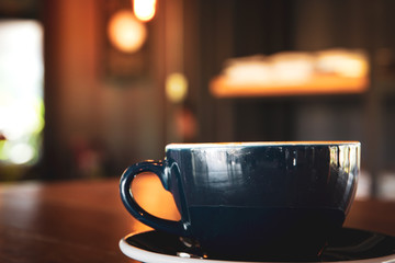 Cup of coffee close up.  Processed in vintage color tone.