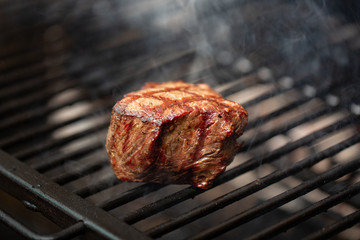 Beef Loin Top Sirloin Steak Cooking on the Grill