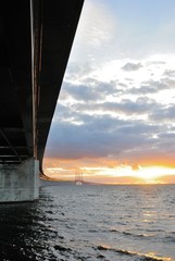 The Øresund (Oresund) Bridge seen from the Sweden side on sunset