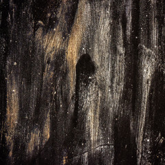 metal surface covered with burnt old black paint. Element of design.