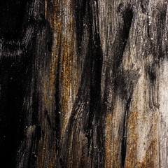 metal surface covered with burnt old black paint. Element of design.