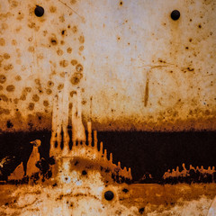 old rusty metal surface with traces of paint. Element of design.