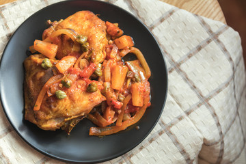 Delicious baked chicken with vegetables and capers