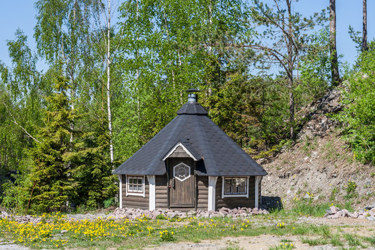 Hut in the glade of dandelions, Karelia