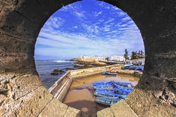 Fishing Harbor and Distant Mediterranean Landscape in Essaouira, Morocco viewed through Textured...