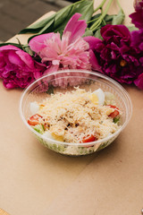 Close-up view of Caesar salad with cheese