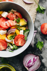 Delicious Greek salad or Horiatiki salad with ingredients