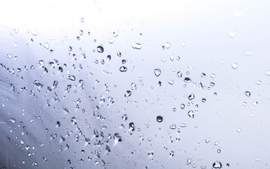 Drops of water on a light background for design