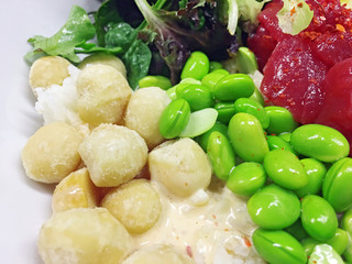 diced raw fish with nuts, vegetables and rice 