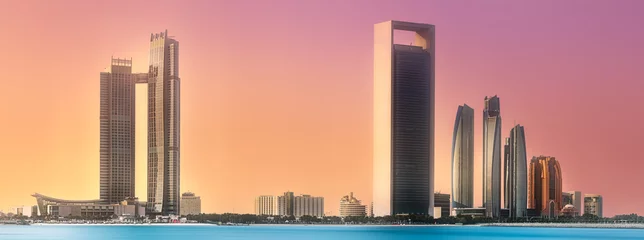 Poster Uitzicht op de skyline van Abu Dhabi bij zonsopgang, Verenigde Arabische Emiraten © boule1301