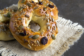 Bagels with cream cheese, salmon, Turkey, shrimp. On a black background.
