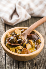 Pickled mushrooms. Marinated boletus.