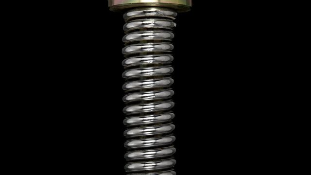 test of reliability of a spring, compression and decompression by a hydraulic press, close-up