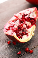 Ripe and juicy pomegranate. Red organic pomegranate.