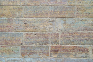 The image of old bright brick wall closeup.
