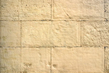 The image of old yellow brick wall closeup.