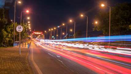 Car lights In traffic at night