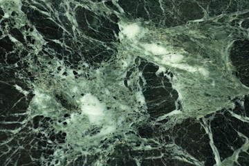 The dark green marble. Facing stone. Texture