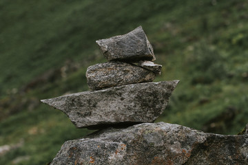 A Road in Norway heading between two hills.