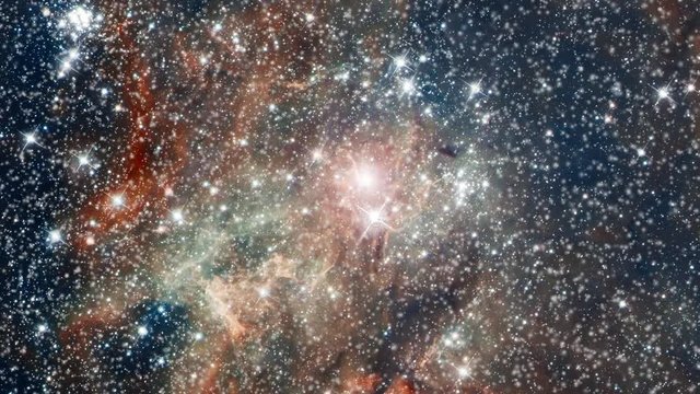 Travel to tarantula nebula also know 30 doradus star nursery in outer space with infinite  flying star field and flare light. Contains public domain image by NASA