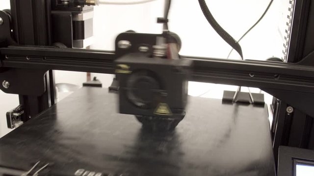 Close up timelapse of a three dimensional printer making a decorative egg.