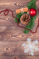 Christmas and New Year holiday background. Christmas decor on a wooden table. Top view, blank space