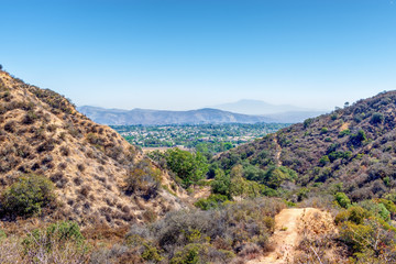 Hiking trails lead to city below