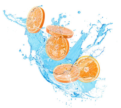 orange slices in water splash isolated on a white background