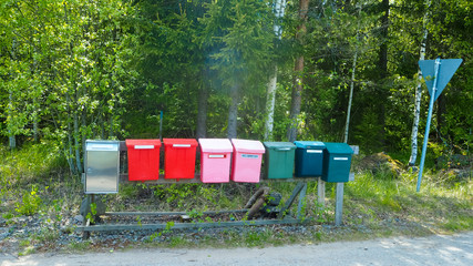 finnish mailboxes next to the street