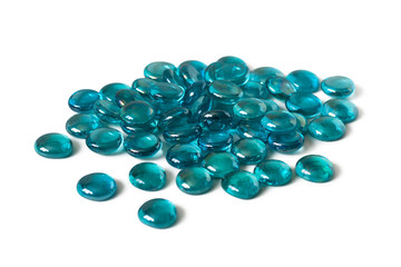 Stack of decorative glass stones, turquoise color, isolated on white background. Stones for homemade creativity
