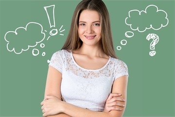 Discouraged young female student with books