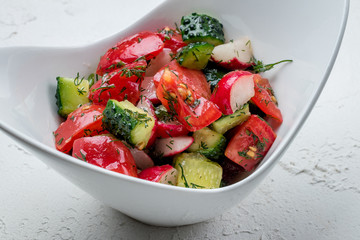 Vegetable salad with tomatoes and cucumbers