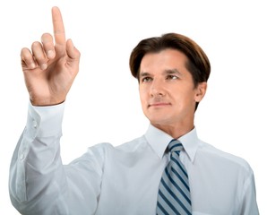 Portrait of young handsome businessman isolated on white