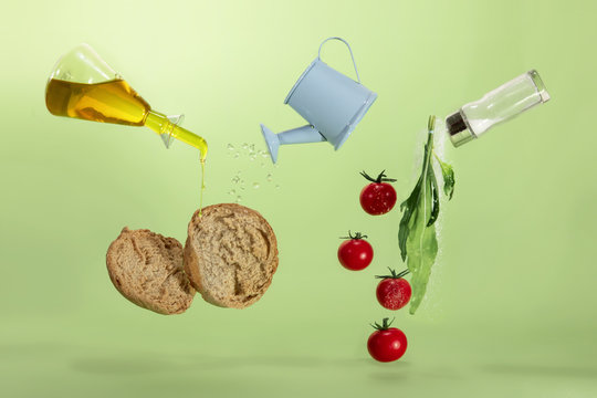 Rocket, tomato and bread with olive oil