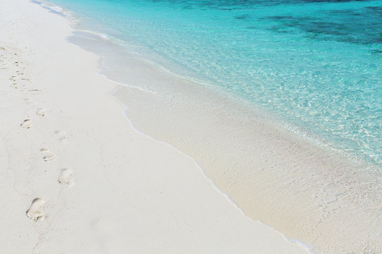 Footprints In Sand On A Tropical Beach, Maldives