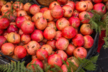 Fresh pomegranates fro sale at a market in Rome, Italy