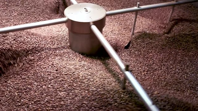 full HD 1080p 30fps - Chilling Roasted coffee beans on spinning cooling tray