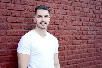 Obraz premium Portrait of latin man looking at camera